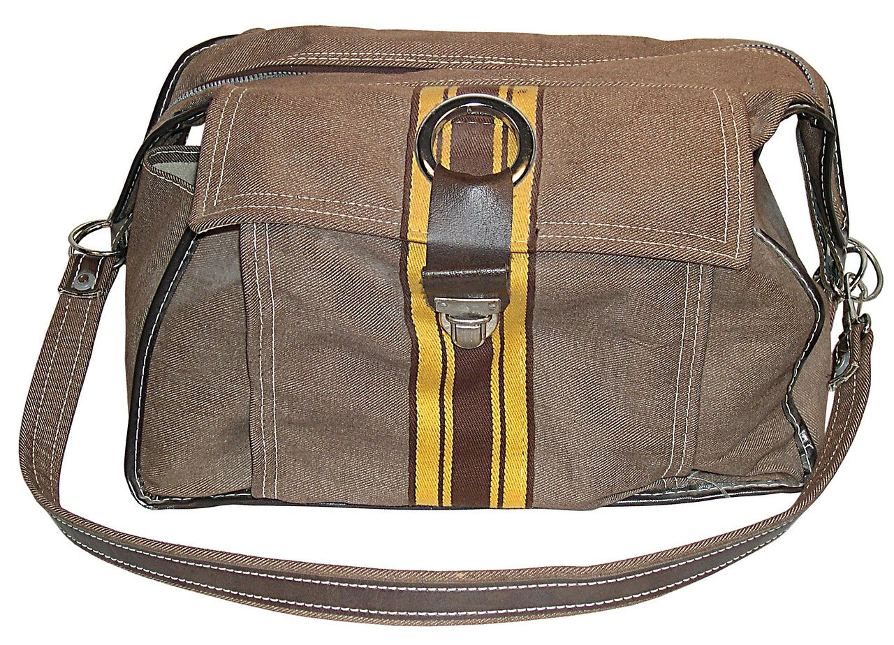 Leather messenger bag with a woven shoulder strap